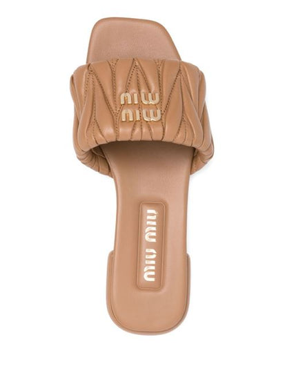MATELASSÉ LEATHER FLAT SANDALS