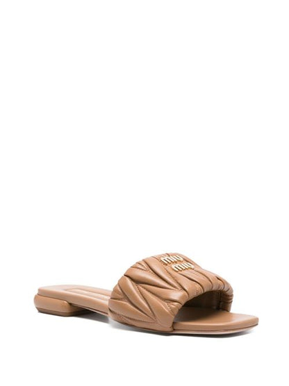 MATELASSÉ LEATHER FLAT SANDALS