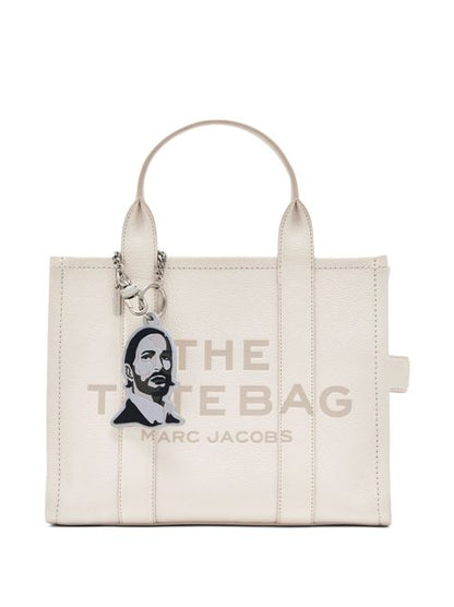 THE MARC FACE CHARM